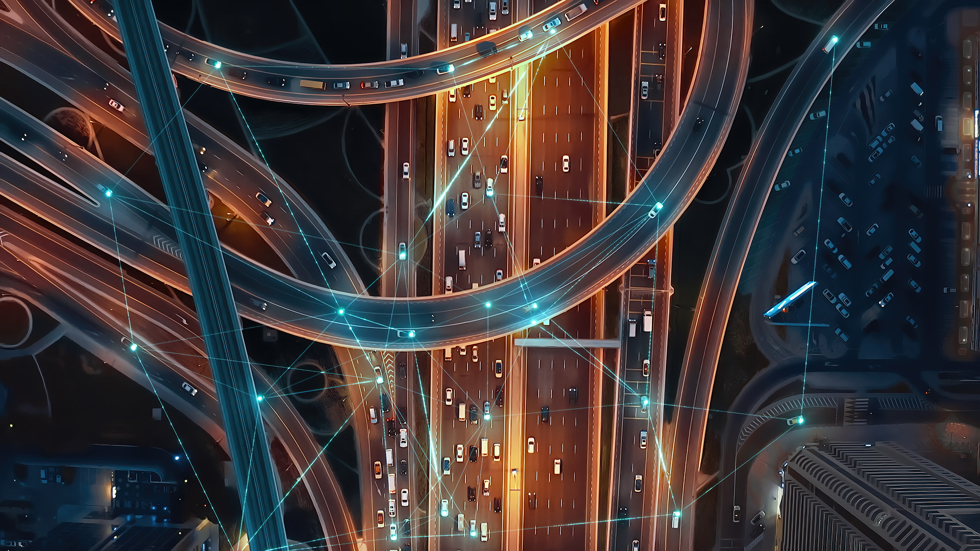 Ein vielbefahrendes Straßennetz von oben fotografiert. Die Autos sind via Lichtstrahlen miteinander verbunden.